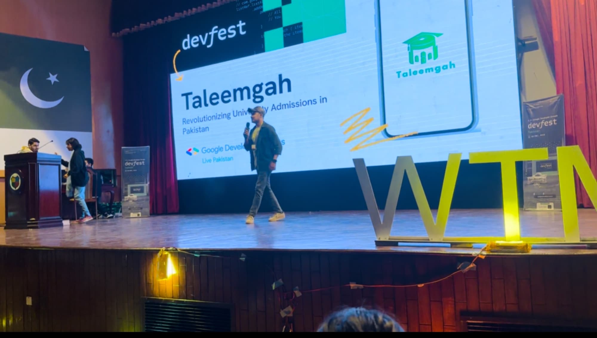 On-stage Taleemgah product pitch at GDG DevFest, GIKI University